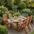 Gartenmöbel-Set aus Eukalyptusholz Ovaler Tisch Oldham + 4 Calgary Stühle mercuroius.webp