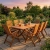 Gartenmöbel-Set aus Eukalyptusholz Tisch Bradford (200x100 cm) + 8 Calgary Stühle Berlin mercurius.webp